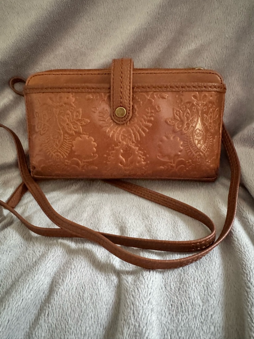 The Sak Iris Large Smartphone Crossbody Tobacco Floral Embossed Leather